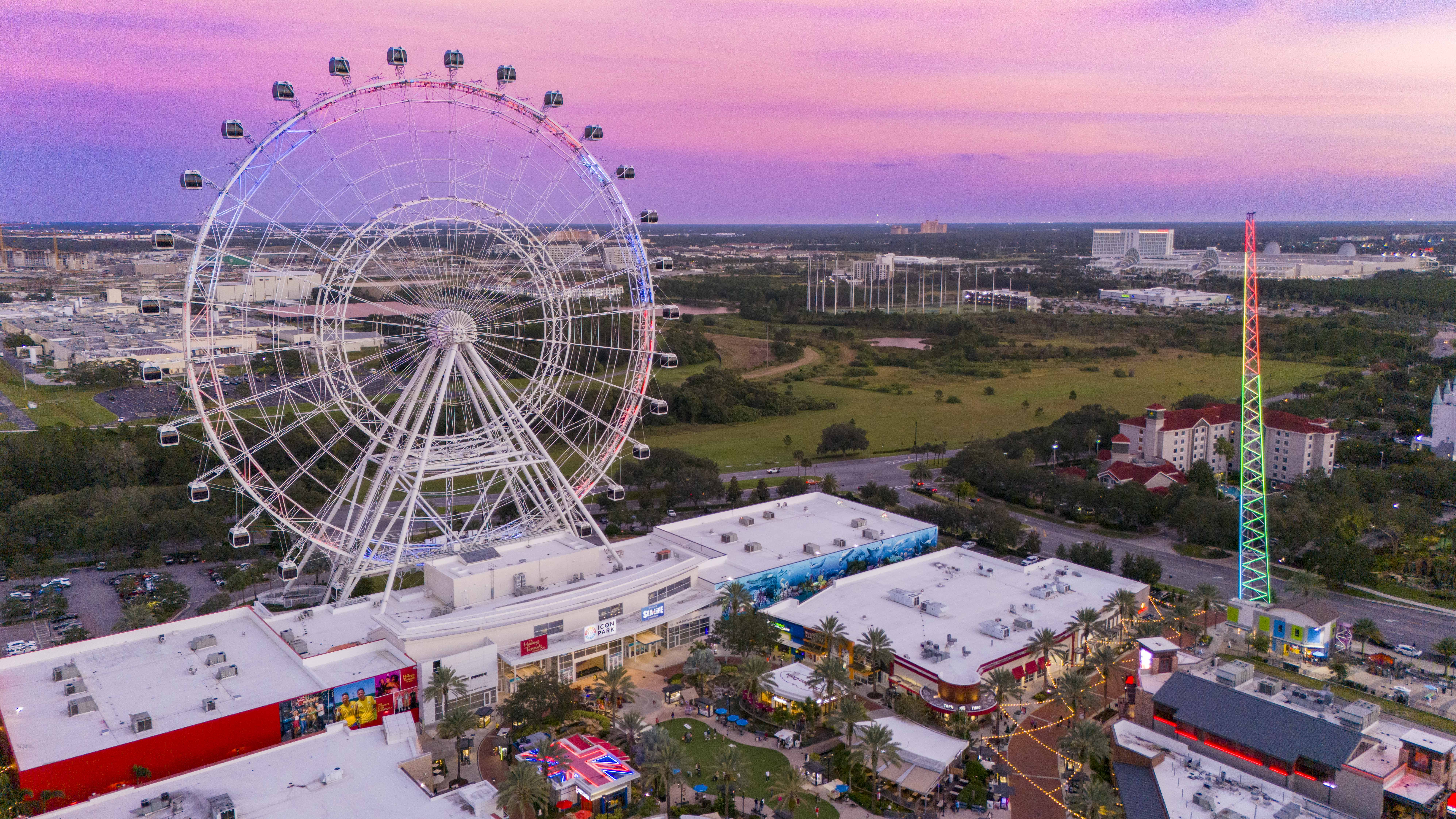 Overhead view of The Orlando Eye and several surrounding Icon Park attractions. 